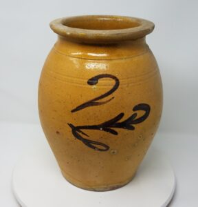 Two-gallon ovoid Whitewater storage jar with manganese fern with a sinuous tail. Attributed to the Fremont Street or Depot Pottery. We attribute this piece to the Depot or Fremont Street Pottery. Private collection.