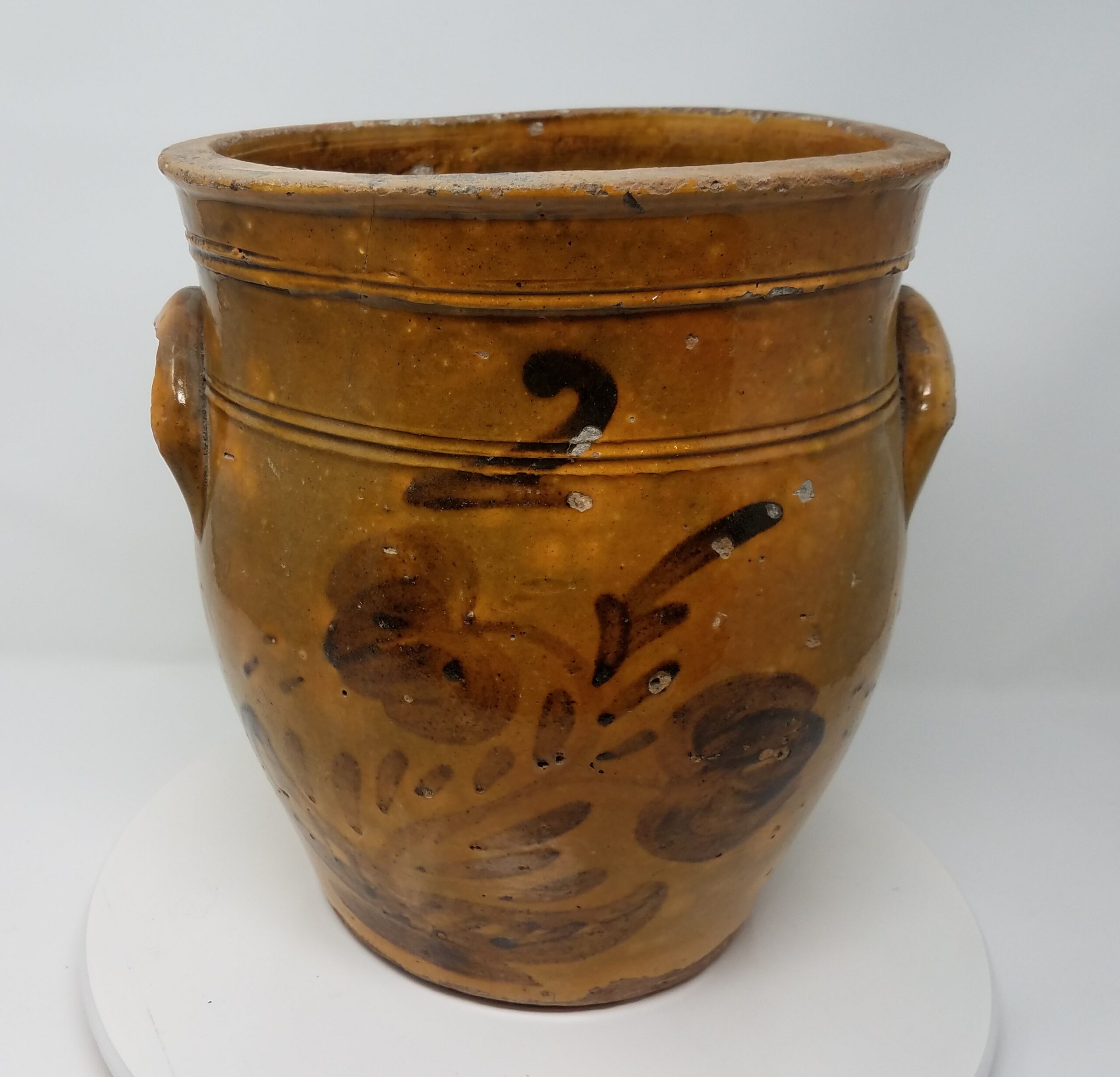 Two-gallon cream pot with a distinctive glaze, form and decoration. This could be an 1840's or early 1850's Cravath Pottery piece.