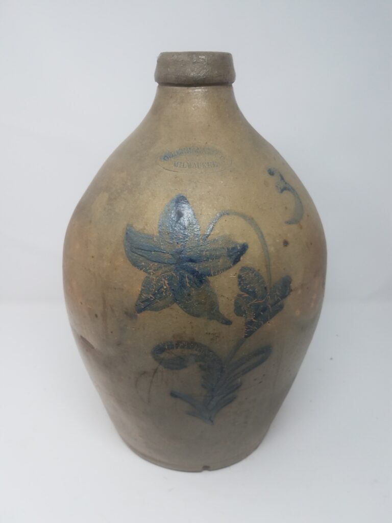 The star flower decoration on this jug is unusual for Hermann. Unlike some other potters who adopted standardize decorations, the Hermann pottery did not. Apparently, Hermann decorator were free to do as they pleased.