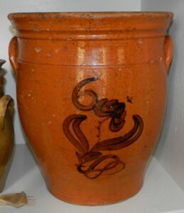 Despite predominantly light colored clay in Whitewater there are examples that look more like redware, despite having a clear lead glaze. This is due to oxidized iron in the clay, either due to prolonged exposure to oxygen or more iron content in certain layers of the clay. Private collection.