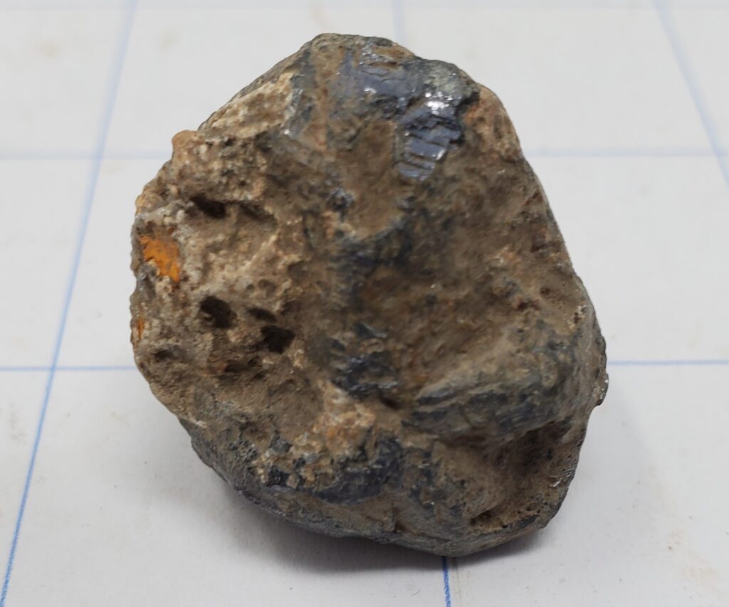 Walnut sized lump of Galena found among pottery fragments. From the Collection of Mark Knipping.