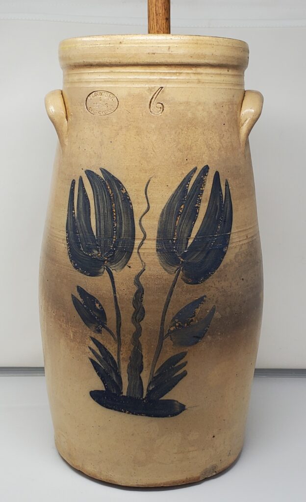The cobalt elongated four-petal tulip decoration on this six-gallon churn is exceptional. Private collection.