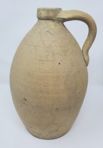 Whitewater jug with a very light tinted lead glaze inside and out. No decoration. Private collection.